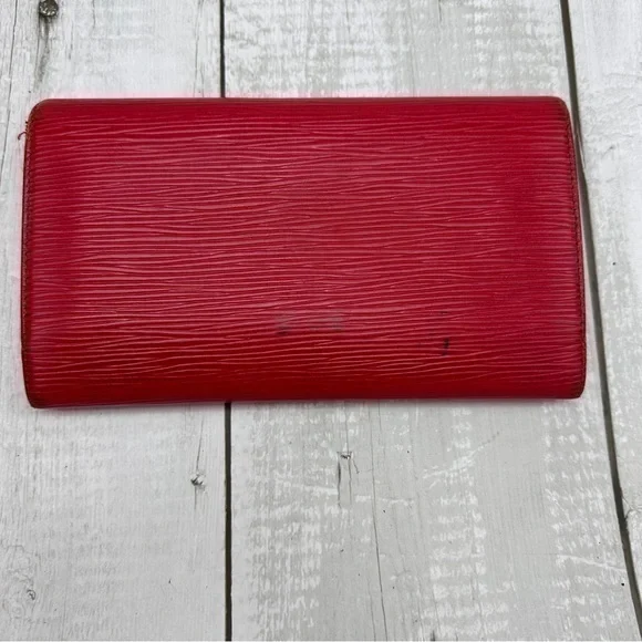 AUTHENTIC Louis Vuitton Epi leather trifold wallet/billfold. Red.